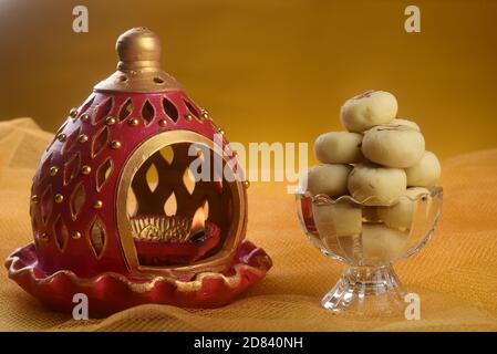 Diwali Lamp, Pedha or peda is an Indian Traditional sweet dish made from milk Stock Photo