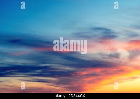 Backgrounds and textures. Beautiful and dramatic colorful sky with clouds at sunset. Sky texture. Abstract nature background. Stock Photo