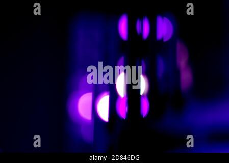 Blurry light circles in the dark. Stock Photo