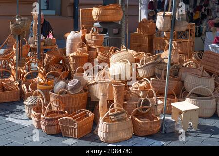 Group of empty wicker baskets for sale in a market place Stock Photo