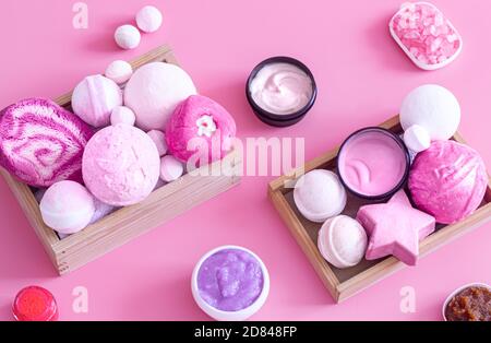 Spa composition with body care items on a colored background . Spa and body care concept . Flatlay. Stock Photo