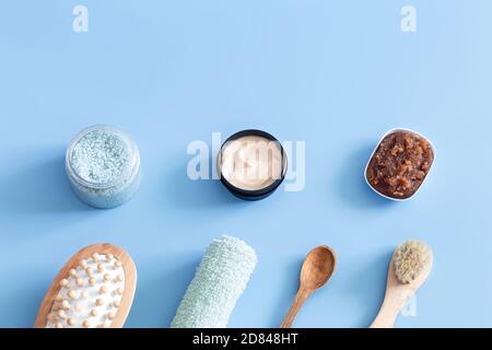 Spa composition with body care items on a colored background . Spa and body care concept . Flatlay. Stock Photo