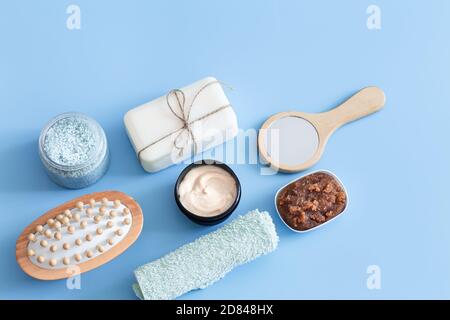 Spa composition with body care items on a colored background . Spa and body care concept . Flatlay. Stock Photo