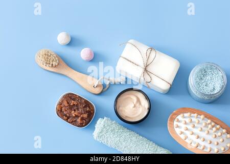 Spa composition with body care items on a colored background . Spa and body care concept . Flatlay. Stock Photo