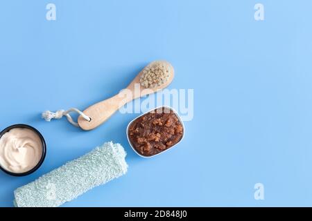 Spa composition with body care items on a colored background . Spa and body care concept . Flatlay. Stock Photo