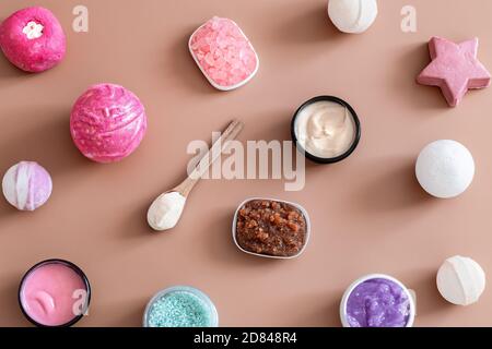 Spa composition with body care items on a colored background . Spa and body care concept . Flatlay. Stock Photo