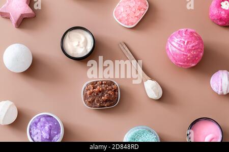 Spa composition with body care items on a colored background . Spa and body care concept . Flatlay. Stock Photo