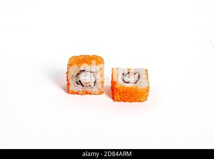 Roll sushi with salmon cream cheese on a white isolated background. Sushi menu. Stock Photo