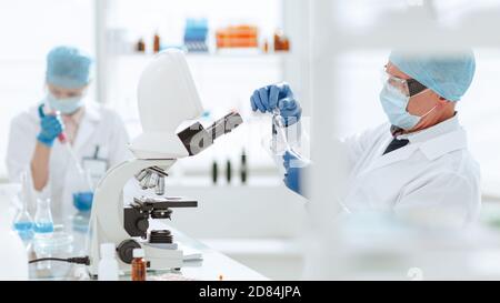 close up. scientist microbiologist working in the laboratory. Stock Photo