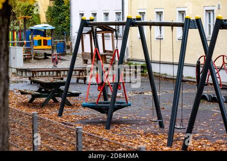 Pfarrkirchen, Germany. 27th Oct, 2020. Menschenleer is a playground in front of a child crèche in the city centre. In view of extremely increased corona numbers, strict exit restrictions now apply in the Lower Bavarian district of Rottal-Inn. Credit: Armin Weigel/dpa/Alamy Live News Stock Photo