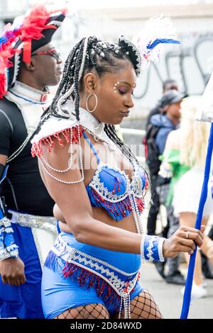 London, United Kingdom, August 27th 2018:- Participants take part in the Nottinghill Carival in west London, Europe's largest street party. Stock Photo