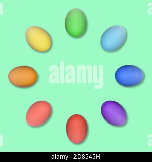 Set of colorful Easter eggs grouped in a circle isolated on green background. Stock Photo
