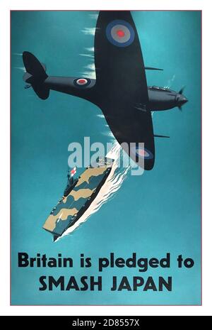 1940s UK WW2 Propaganda Poster ‘Britain is pledged to SMASH JAPAN’ Featuring The Royal Navy Ark Royal aircraft carrier and a RAF Spitfire aircraft flying overhead World War II Second World War Stock Photo