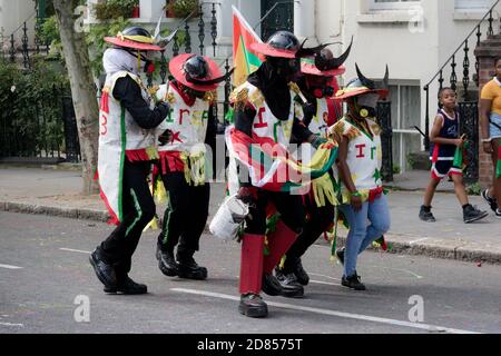 London, United Kingdom, August 25th 2019:- A group of performers at the Notting Hill Carnival in West London, the Notting Hill Carnival is Europe's la Stock Photo