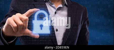 Closeup of businessman holding security padlock hologram Stock Photo