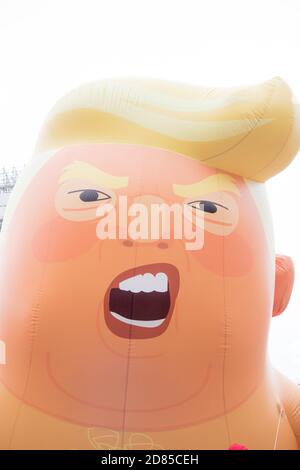 London, United Kingdom, June 4th 2019:- The face of the Trump Baby Blimp in Parliament Square Stock Photo