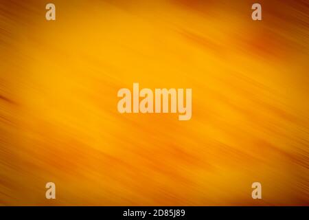 Abstract Background - Multicolored Diagonal stripes lines. Blurred background. Design Element. Bright Colors. Red, Orange. Stock Photo