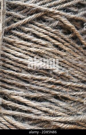 Stranded threads. A tangle of yarn. Entangled confusing thread on a roll Stock Photo