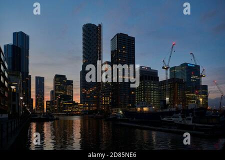 Office buildings and residential towers at dusk, Canary Wharf, Docklands, East end of London, UK Stock Photo
