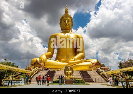 AYUTTHAYA,THAILAND, JUN 03 2020, The large golden sitting Buddha statue at Wat Muang temple located Ang Thong and Ayutthaya. Stock Photo