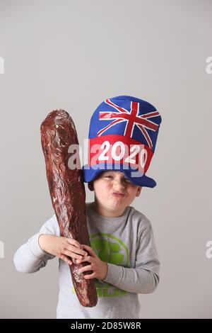 Young boy wearing 2020 Union Jack hat 