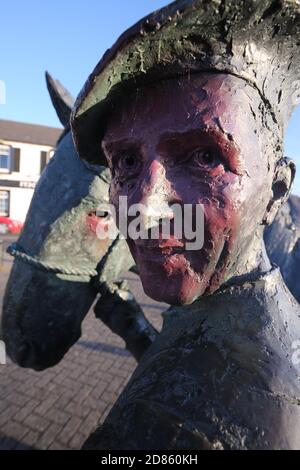 Irvine, Scotland, 21 June 2019 This statue, by David Annand, stands on Irvine Harbourside, where - in the years before the dredging of the Clyde led to the growth of Glasgow - carters plied their trade, transporting goods from sea-going ships for distribution throughout Ayrshire and the West of Scotland. It was unveiled in 1996 by Captain Sandy Muir & Maurice Crichton, Chairman of Irvine Development Corporation. Stock Photo