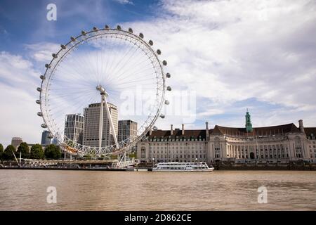 UK, London, Westminster, London Eye and London Marriott County Hall Hotel beside River Thames Stock Photo