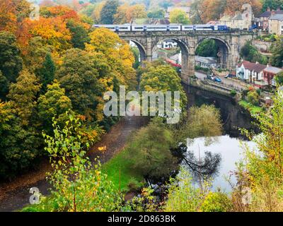 Historic railway viaduct over the River Nidd in autumn at Knaresborough North Yorkshire Yorkshire England Stock Photo