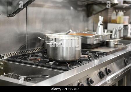 Gas Hob Stove and Grill in Professional Kitchen Restaurant Stock Photo -  Alamy