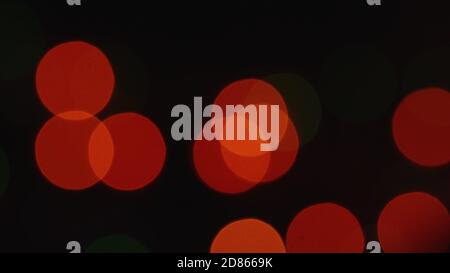 blurred dull shimmering Christmas lights bokeh backdrop of flickering lights Stock Photo