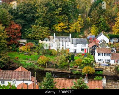 Houses in the Nidd Gorge from the crag top above Abbey Road in autumn Knaresborough North Yorkshire Yorkshire England Stock Photo