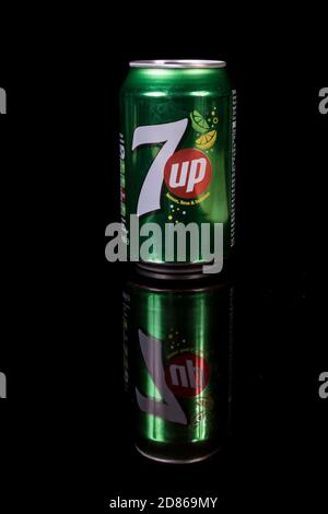 London, 24th October 2017:- A can of 7 Up isolated on a black background