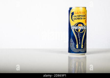 London, 24th October 2017:- A can of Orangina against a white background Stock Photo