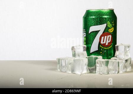 London, 24th October 2017:- A can of chilled 7up with ice against a white background