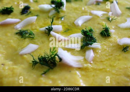 Traditional Greek Fava, yellow split pea puree with olive oil, onion and dill. Stock Photo
