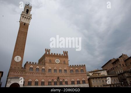 ITALY, TUSCANY, PROVINCE SIENA,SIENA - 07 May 2018: TORRE DEL MANGIA the tower and belfry on the PIAZZA DEL CAMPO and Palazzo Pubblico, Palazzo Comuna Stock Photo