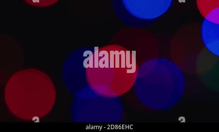 Red and blue shimmering shining lights Deep bokeh abstract background Stock Photo