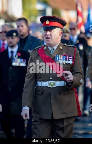 Sandhurst, United Kingdom, 11th November 2018:- British Soldiers march to Sandhurst War Memorial on the 100th Anniversary of the Armistice that ended Stock Photo