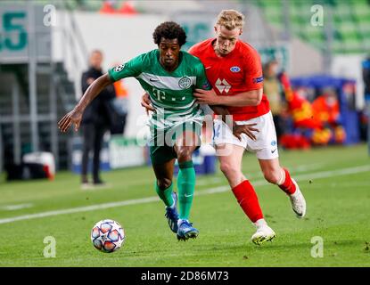 BUDAPEST, HUNGARY - SEPTEMBER 29: Oleksandr Zubkov of Ferencvarosi TC  controls the ball during the UEFA Champions League Play-Offs Second Leg  match between Ferencvarosi TC and Molde FK at Ferencvaros Stadium on