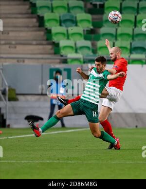 BUDAPEST, HUNGARY - SEPTEMBER 29: Oleksandr Zubkov of Ferencvarosi TC  controls the ball during the UEFA Champions League Play-Offs Second Leg  match between Ferencvarosi TC and Molde FK at Ferencvaros Stadium on