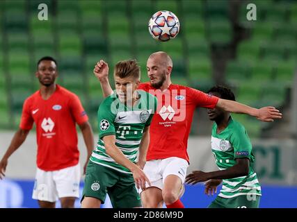 BUDAPEST, HUNGARY - SEPTEMBER 29: Oleksandr Zubkov of Ferencvarosi TC  controls the ball during the UEFA Champions League Play-Offs Second Leg  match between Ferencvarosi TC and Molde FK at Ferencvaros Stadium on