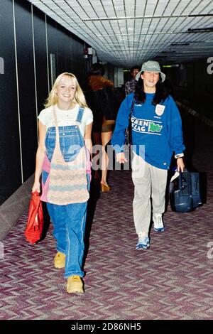 Spice Girl Emma Lee Bunton, baby spice returning from the Far East to London Heathrow Airport, October 1997 Stock Photo