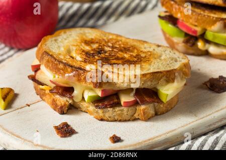 Homemade Bacon Apple Grilled Cheese Panini on White Bread Stock Photo