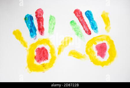 multicolored prints of hands, children's creativity, drawing Stock Photo