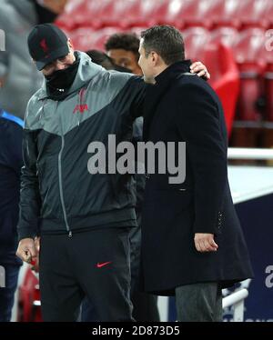 Liverpool manager Jurgen Klopp (left) greets FC Midtjylland head coach Brian Priske before the UEFA Champions League Group D match at Anfield, Liverpool. Stock Photo