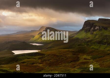 Moody rain clouds over popular travel destination; The Quiraing on the Isle of Skye, Scotland, UK. Stock Photo