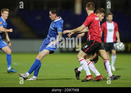 Hartepool, County Durham, UK. 27th Oct 2020. Hartlepool United's Gavan  Holohan in action with Altrincham's Tom Hannigan during the Vanarama  National League match between Hartlepool United and Altrincham at Victoria  Park, Hartlepool