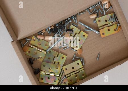 New disassembled cabinet on the floor in the kitchen of the apartment Stock Photo