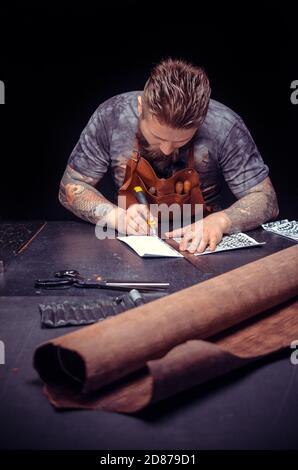 Tanner of leather being keen on his buisness Stock Photo