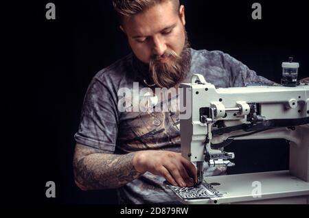 Leather cutter creates quality product of leather Stock Photo